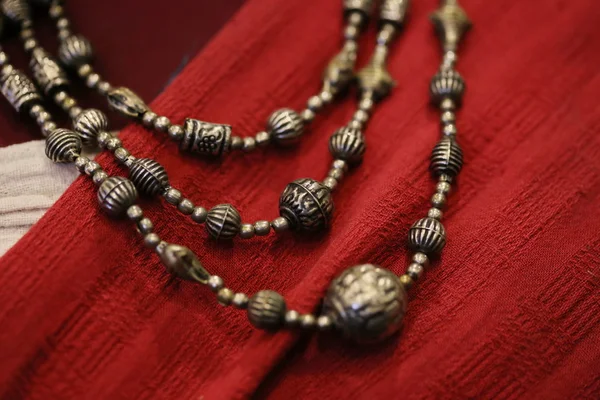 Vintage Metal Necklace Red Fabric — Stock Photo, Image