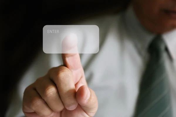 Zakenman vinger te klikken botton achtergrond — Stockfoto