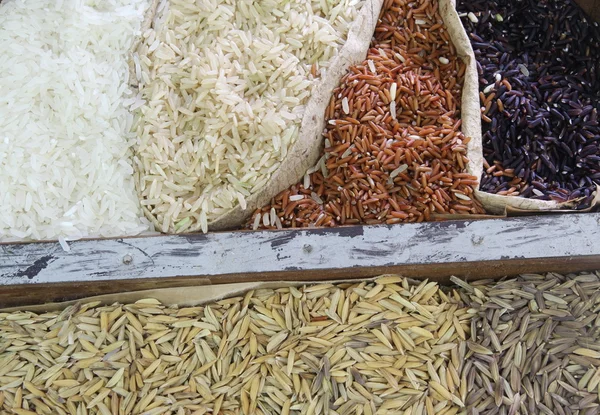 Close up organic rice in sack bag — Stock Photo, Image