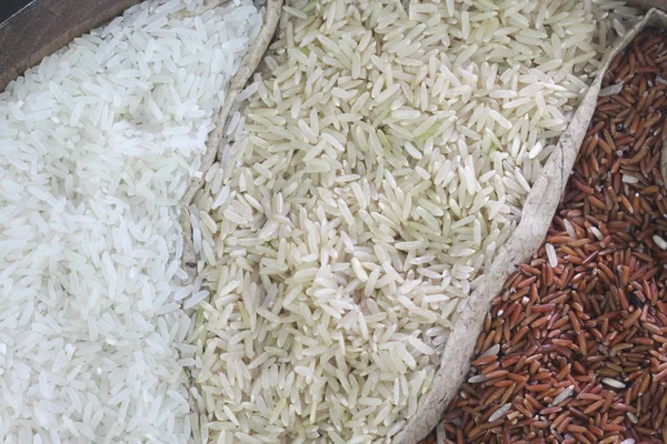 Close up organic rice in sack bag — Stock Photo, Image