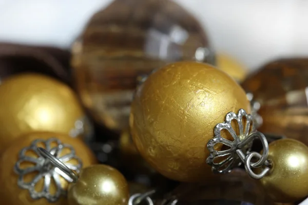 Macro gold bead ,golden ball and pearl — Stock Photo, Image