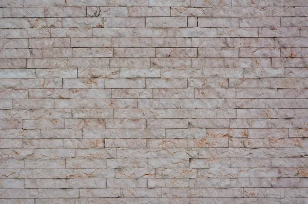 Steinmauer mit abstrakten Mustern — Stockfoto