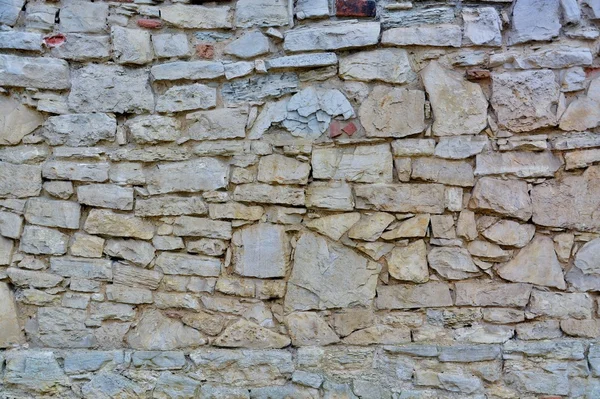 Steinmauer mit abstrakten Mustern — Stockfoto