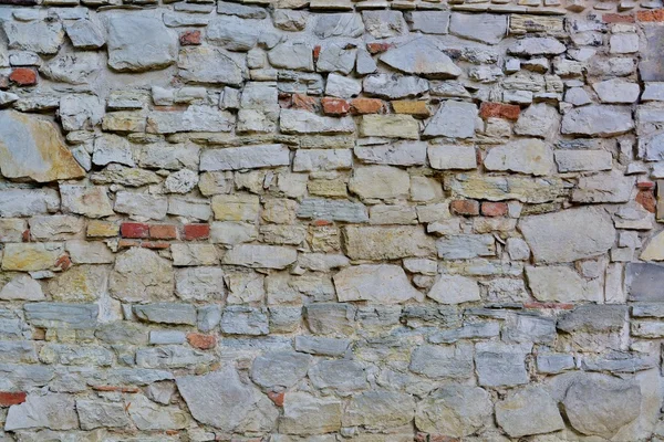 Steinmauer mit abstrakten Mustern — Stockfoto