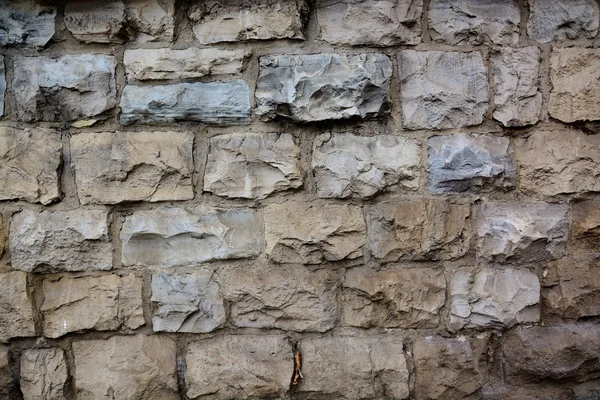 Stone wall with abstract pattern — Stock Photo, Image