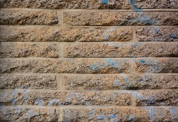 Steinmauer mit abstrakten Mustern — Stockfoto