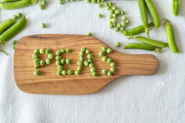 Decoração Ervilhas Verdes Frescas Com Palavra Peas Feita Ervilhas Verdes — Fotografia de Stock