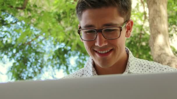 Student Using Laptop Computer Outside — Stock Video