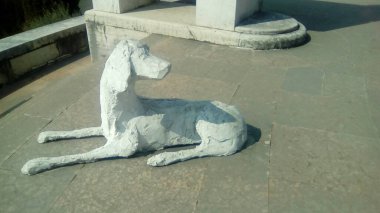 Vittoriale degli Italiani, Italy - March 2018: statue of a dog clipart