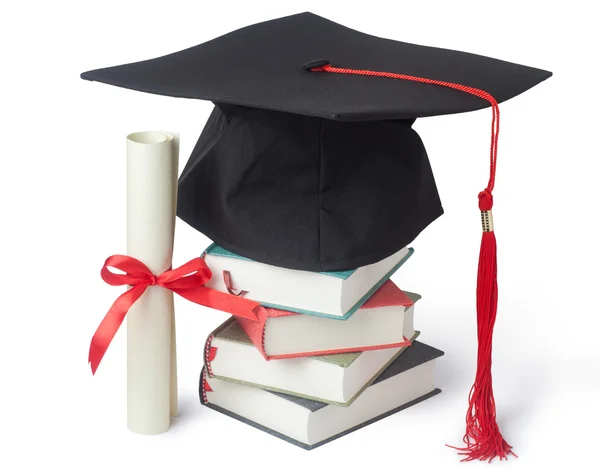 Graduation cap and diploma with books — Stock Photo, Image