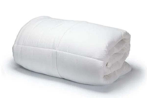 Warm and confortable folded white quilt — Stock Photo, Image