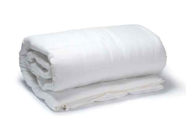 Warm and confortable folded white quilt — Stock Photo, Image