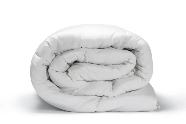 Warm and confortable folded white quilt — Stock Photo, Image