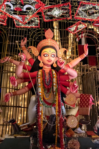 stock image Goddess Durga idol decorated at puja pandal in Kolkata, West Bengal, India. Durga Puja is biggest religious festival of Hinduism and is now celebrated worldwide.