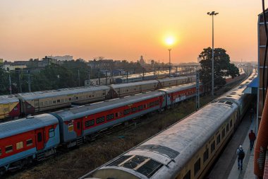 A view of express trains at a Junction Railway Station of Indian Railways system, Kolkata, India on February 2021 clipart