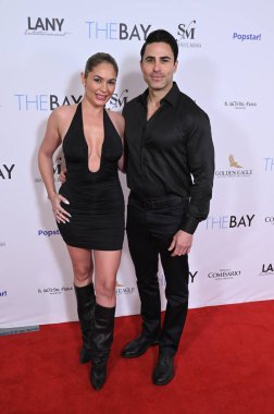 Burbank, CA USA. 10 Aralık 2025. Christiana Leucas, Carlo Mendez, The Bay 10. Sezon Prömiyer Gösterimi