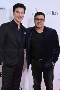 Burbank, CA USA. 10 Aralık 2025. Daniel Wang, Gregori Martin The Bay 10. Sezon Prömiyer Gösterimi