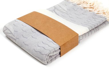 Peshtemal Türk havlusu spa, plaj, havuz, hafif seyahat, sağlıklı moda ve hediyeler için renkli tekstil katlandı. Geleneksel Türk hamamı malzemesi, eşarp