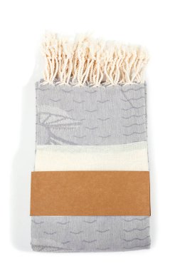 Peshtemal Türk havlusu spa, plaj, havuz, hafif seyahat, sağlıklı moda ve hediyeler için renkli tekstil katlandı. Geleneksel Türk hamamı malzemesi, eşarp