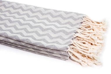 Peshtemal Türk havlusu spa, plaj, havuz, hafif seyahat, sağlıklı moda ve hediyeler için renkli tekstil katlandı. Geleneksel Türk hamamı malzemesi, eşarp