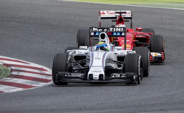 FORMULA ONE TEST DAYS 2015. МАССА И РАЙККОНЕН — стоковое фото