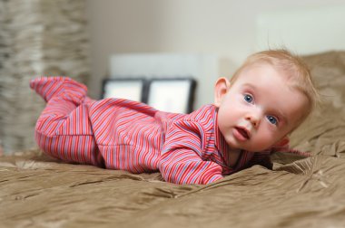 baby boy lying on belly clipart