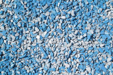 Arka plan ve küçük plaser makadam taş dokusuna renkli 