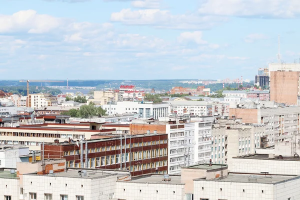 Modern buildings in residential area of big city on hot sunny da — Stock Photo, Image