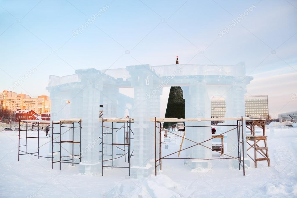 Construction of sculpture with columns in Ice town in Perm, Russ