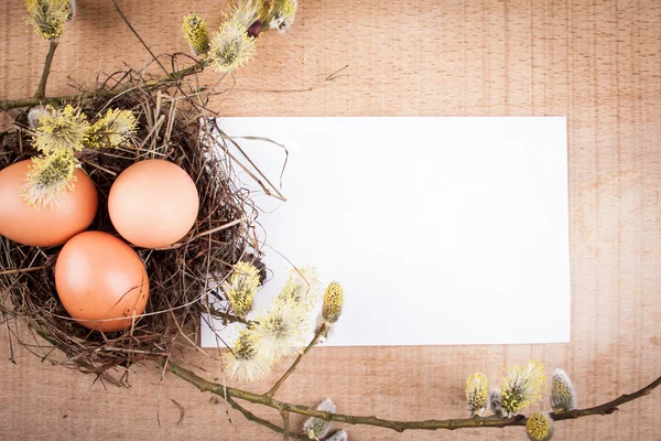 Easter eggs on the wooden table — Stock Photo, Image