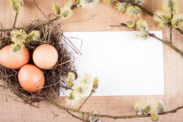 Easter eggs on the wooden table — Stock Photo, Image