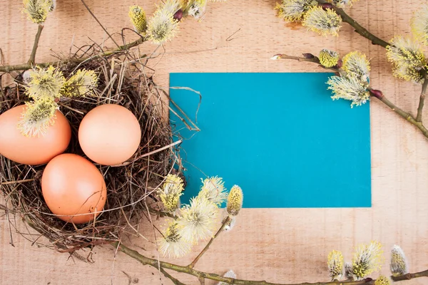 Easter eggs on the wooden table — Stock Photo, Image