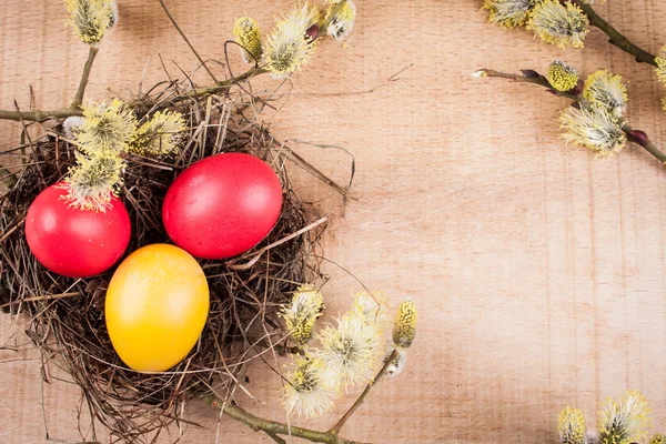 Easter eggs on the wooden table — Stock Photo, Image