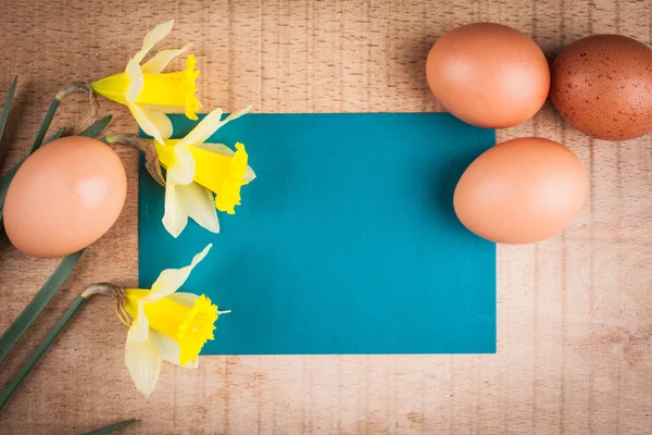 Easter eggs on the wooden table — Stock Photo, Image