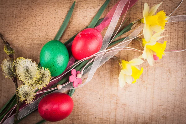 Easter eggs on the wooden table — Stock Photo, Image