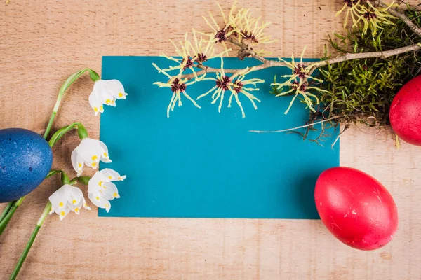 Easter eggs on the wooden table — Stock Photo, Image