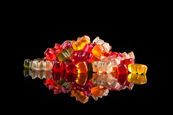 Gummy bears on a black background — Stock Photo, Image