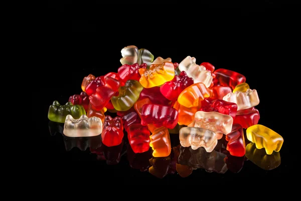 Gummy bears on a black background — Stock Photo, Image