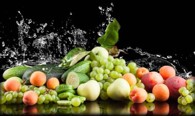 water splash fruits and vegetables on a black background, apple, cucumber, apricot, grapes, zucchini, peaches clipart