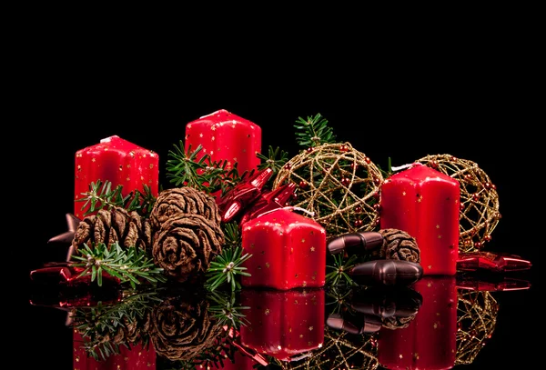 Christmas candles on a black background — Stock Photo, Image