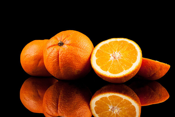 Orange fruit isolated on a black background