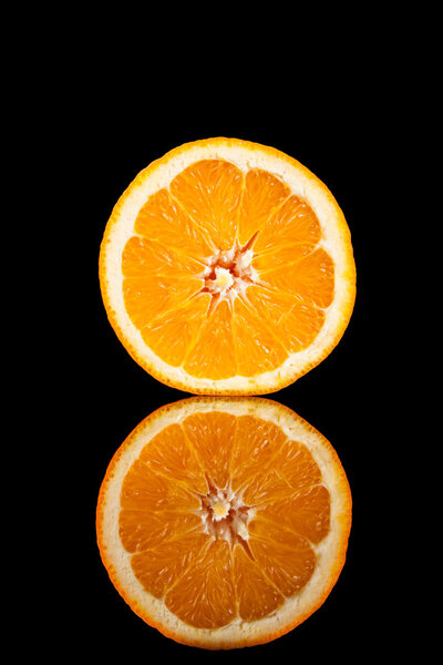 Orange fruit isolated on a black background