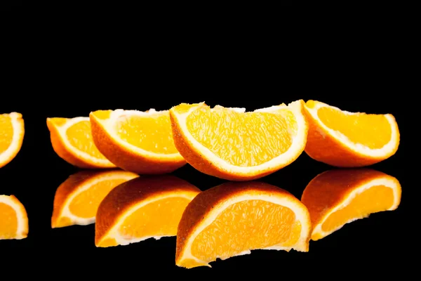 Orange fruit isolated on a black background — Stock Photo, Image