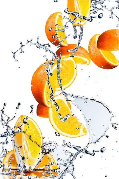 Orange fruits and Splashing water — Stock Photo, Image