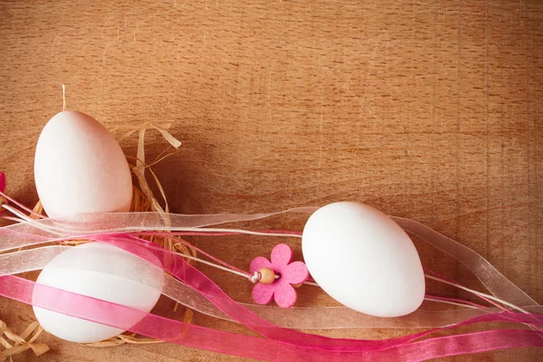Easter eggs on a wooden table — Stock Photo, Image