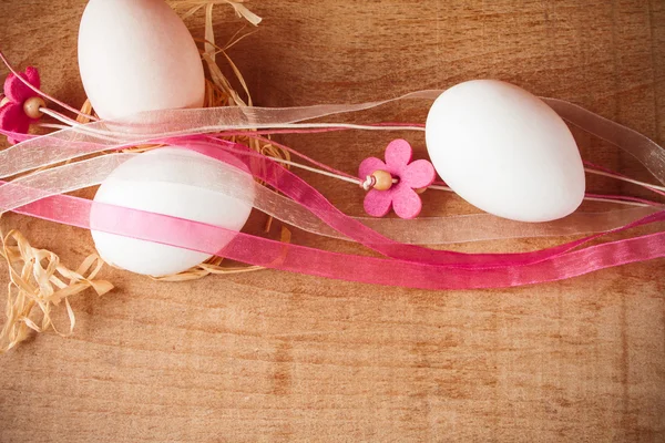Easter eggs on a wooden table — Stock Photo, Image
