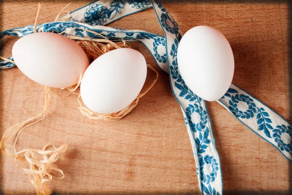 Easter eggs on a wooden table — Stock Photo, Image