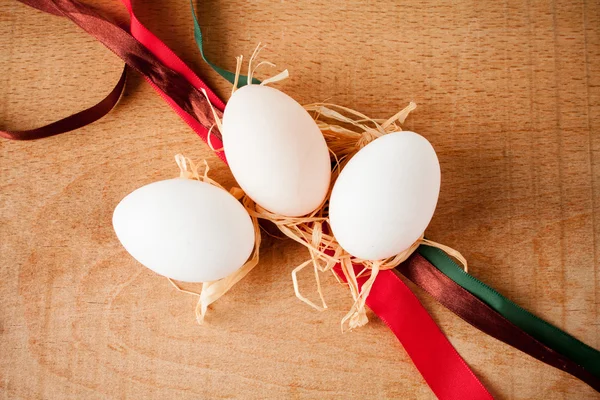 Easter eggs on a wooden table — Stock Photo, Image