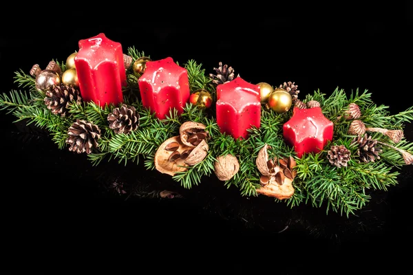 Christmas candles on a black background — Stock Photo, Image