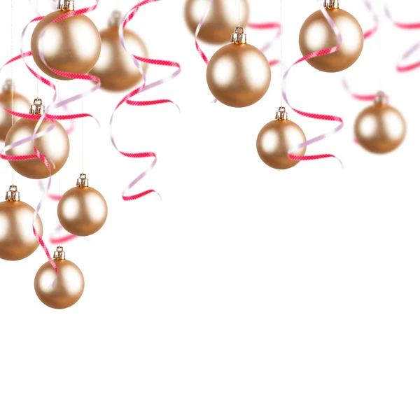 Gold Christmas decorations on a white background — Stock Photo, Image